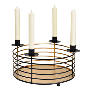 Adventsgesteck aus schwarzem Metall mit vier Kerzenhaltern